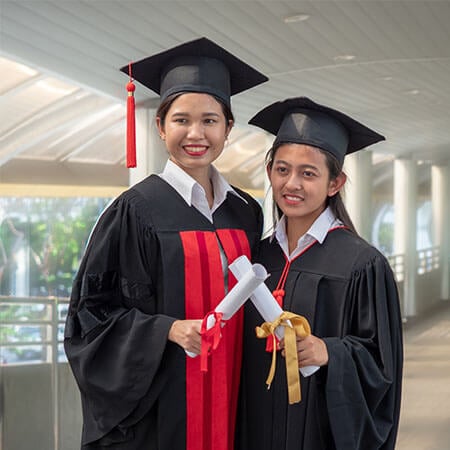 students with graduation certificates