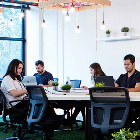 people working in shared office space