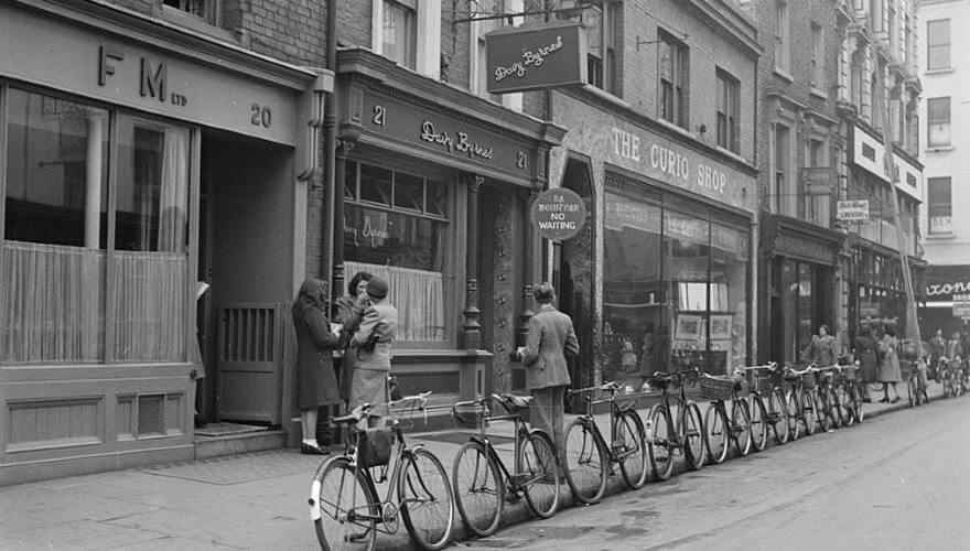 black and white photo of people standing outside davy brynes