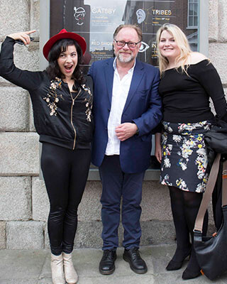 three actors pose for a photo outside the gate theatre