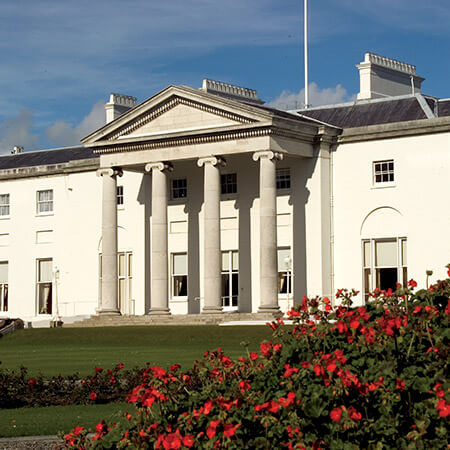 white facade and columned porch of Áras an Uachtaráin