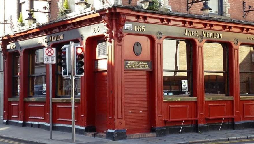 red and black facade on jack nealon's pub on capel street