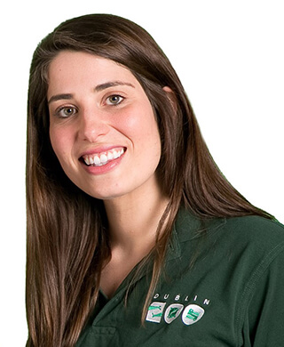 image of brown haired christina murphy who is elephant keeper at dublin zoo in green tee