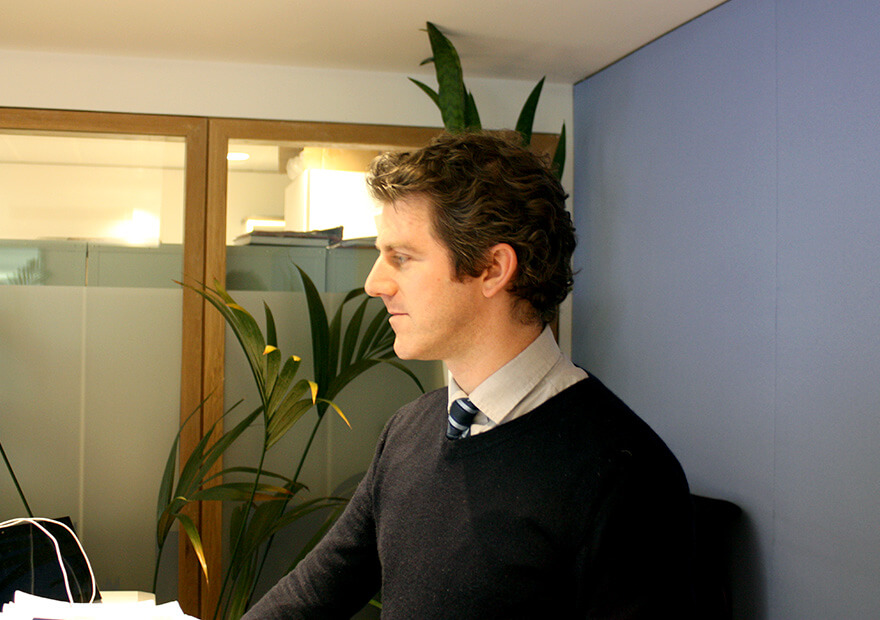 andrew harris wear a short, tie and jumper as he monitors dublin's traffic